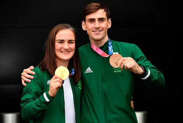 Irish Olympics Athletes holding their medals
